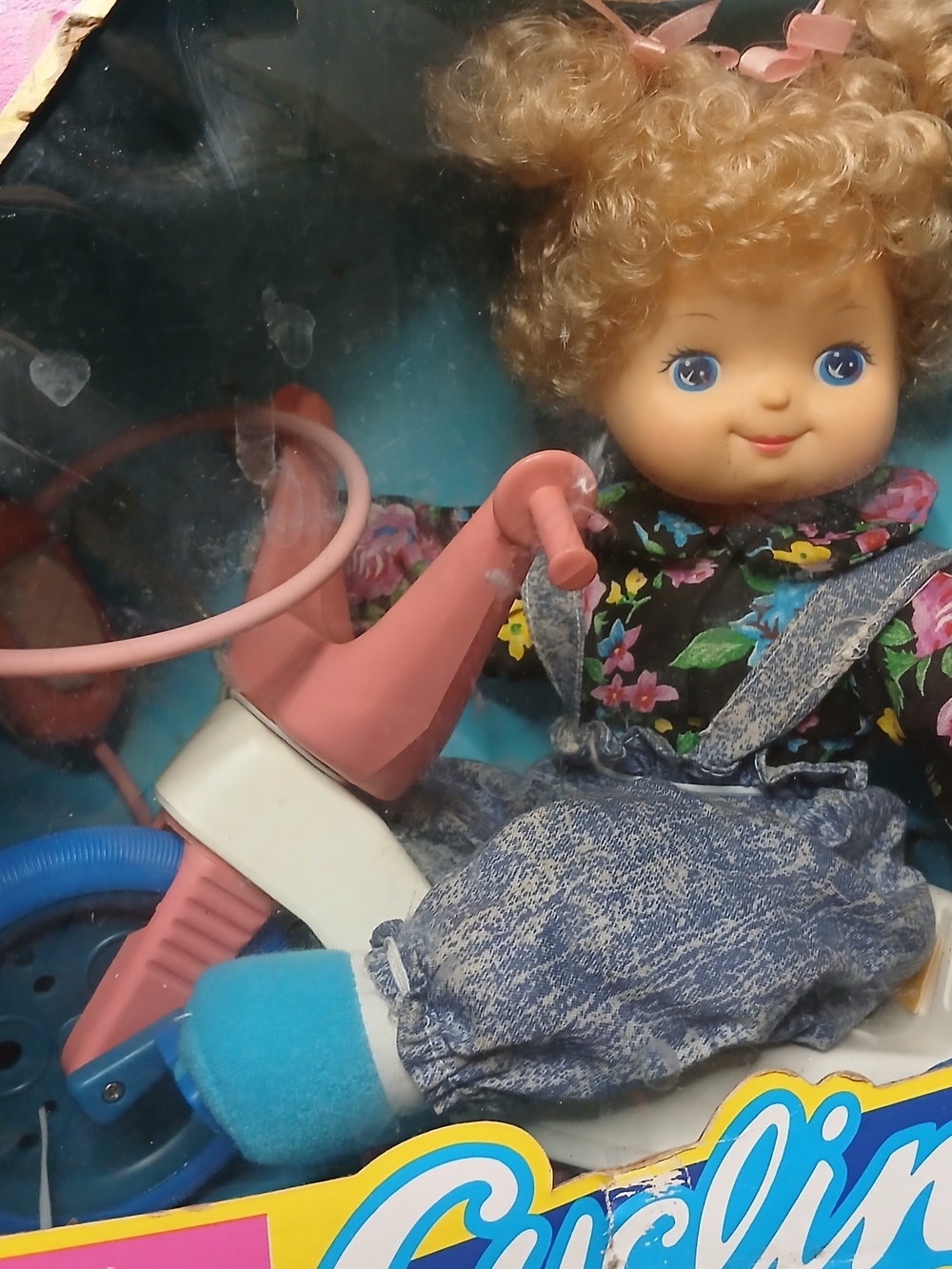 Curly-Haired Doll with Pink Trike Accessory - Floral Outfit